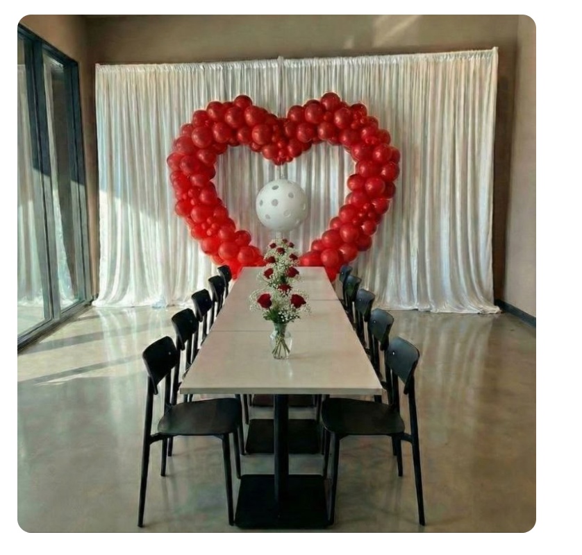 Red heart balloon arch